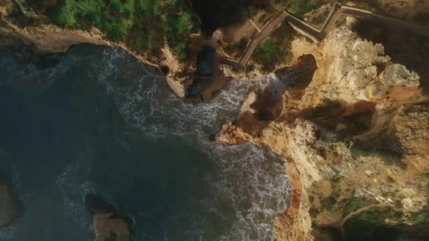 Aerial Shot Directly Raging Ocean Ponta Piedade Headland Group Rock — стокове відео