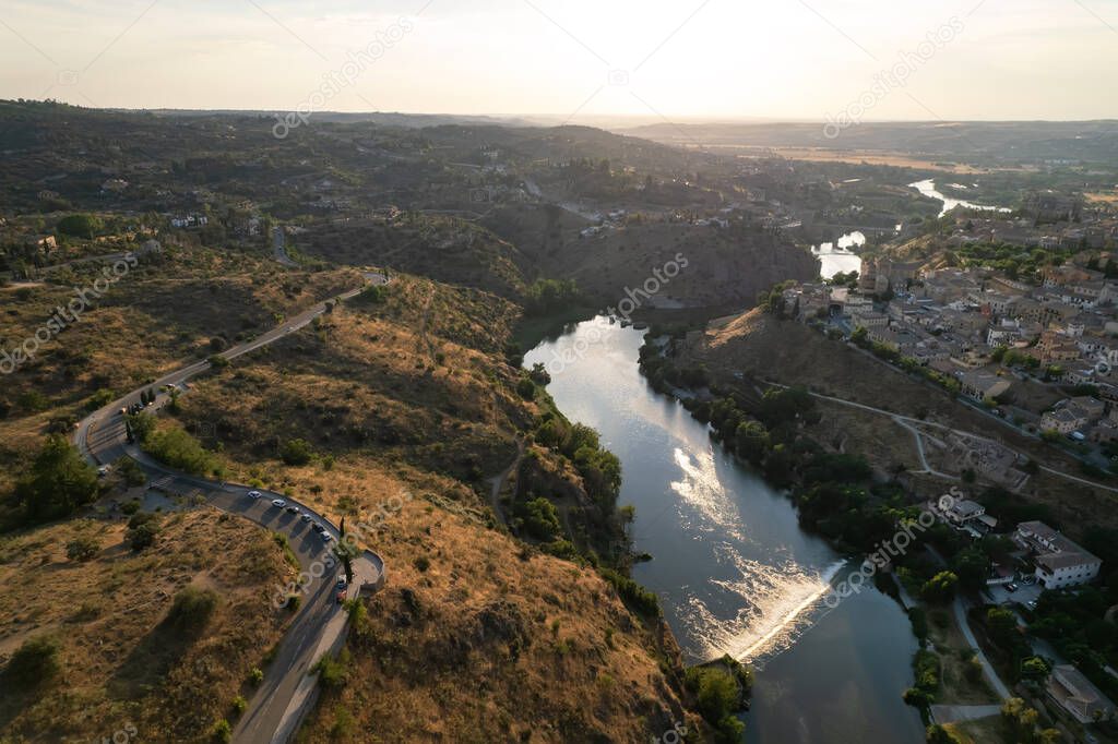 Aerial panoramic drone point of view historical city of Toledo. Castilla La Mancha, declared World Heritage Site by UNESCO. Travel and tourism, famous tourist attraction place concept. Spain. Europe