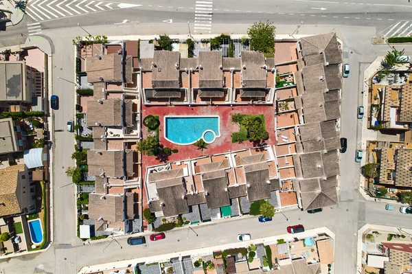 Aerial drone point of view Torre de la Horadada residential houses with swimming pool located on the Mediterranean Sea. Costa Blanca, Spain