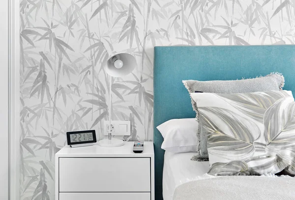 Cosy Bedroom Grey Pillows Turquoise Headboard White Bedside Table Background — Stockfoto