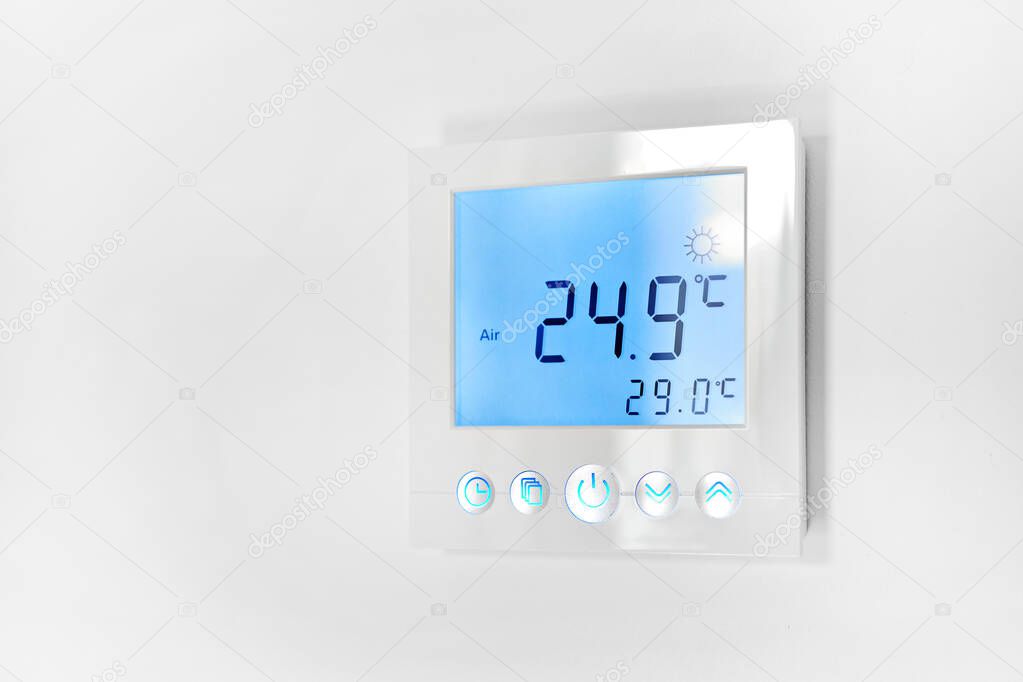 Close up shot mounted on white wall, climate control indoor, remote air-conditioner inside smart home close up view, no people. Modern tech, comfort life concept