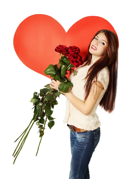 Vrouw met een boeket rozen — Stockfoto