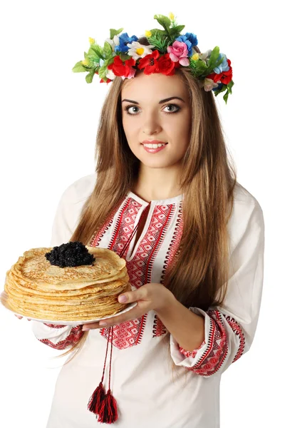 Ukrainian holds pancakes with caviar Stock Picture