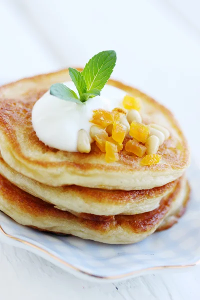 Pancakes with dried fruit — Stock Photo, Image