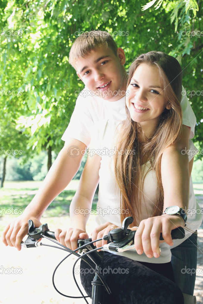 couple on a bicycle