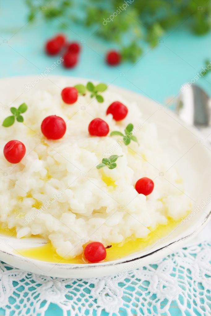 Milk rice porridge with cherry