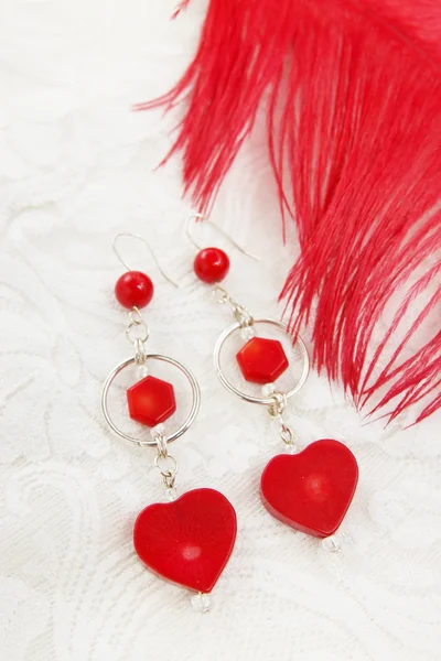 Earrings in coral — Stock Photo, Image