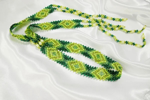 Decoration of green beads — Stock Photo, Image