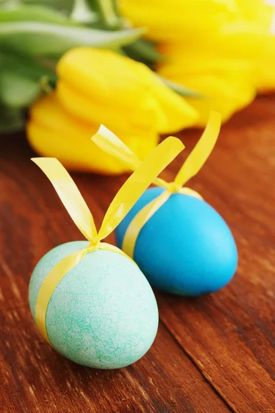 Eggs with ribbon — Stock Photo, Image