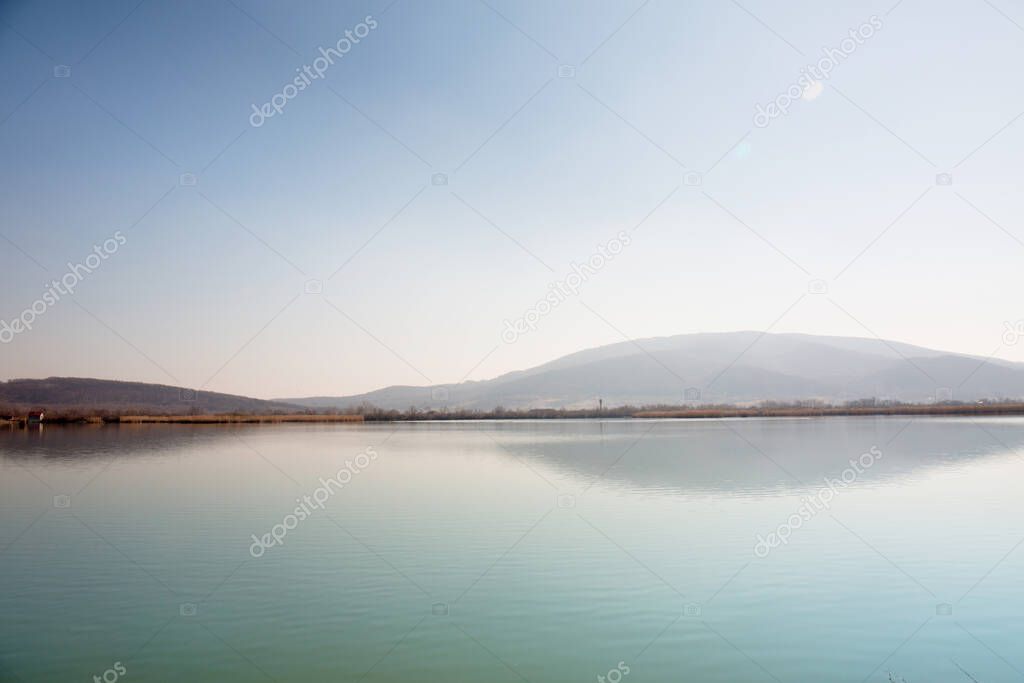Beautiful spring view of the water landscape from the lake to the Black Mountain, Vynohradiv, Transcarpathian region