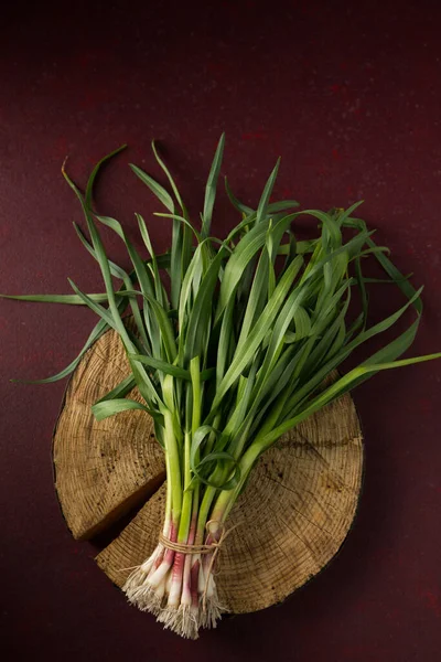 Bunch Young Green Garlic Leaves Dark Background — Foto Stock