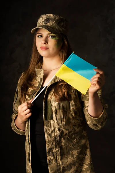 Young Woman Camouflage Makeup Dark Background — Zdjęcie stockowe
