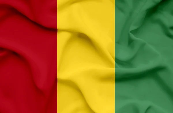 Guinea viftande flagga — Stockfoto