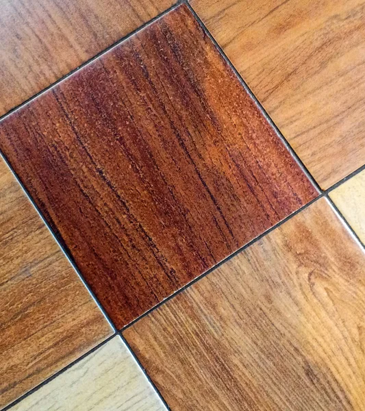 木製の寄せ木張りの床の背景 — ストック写真