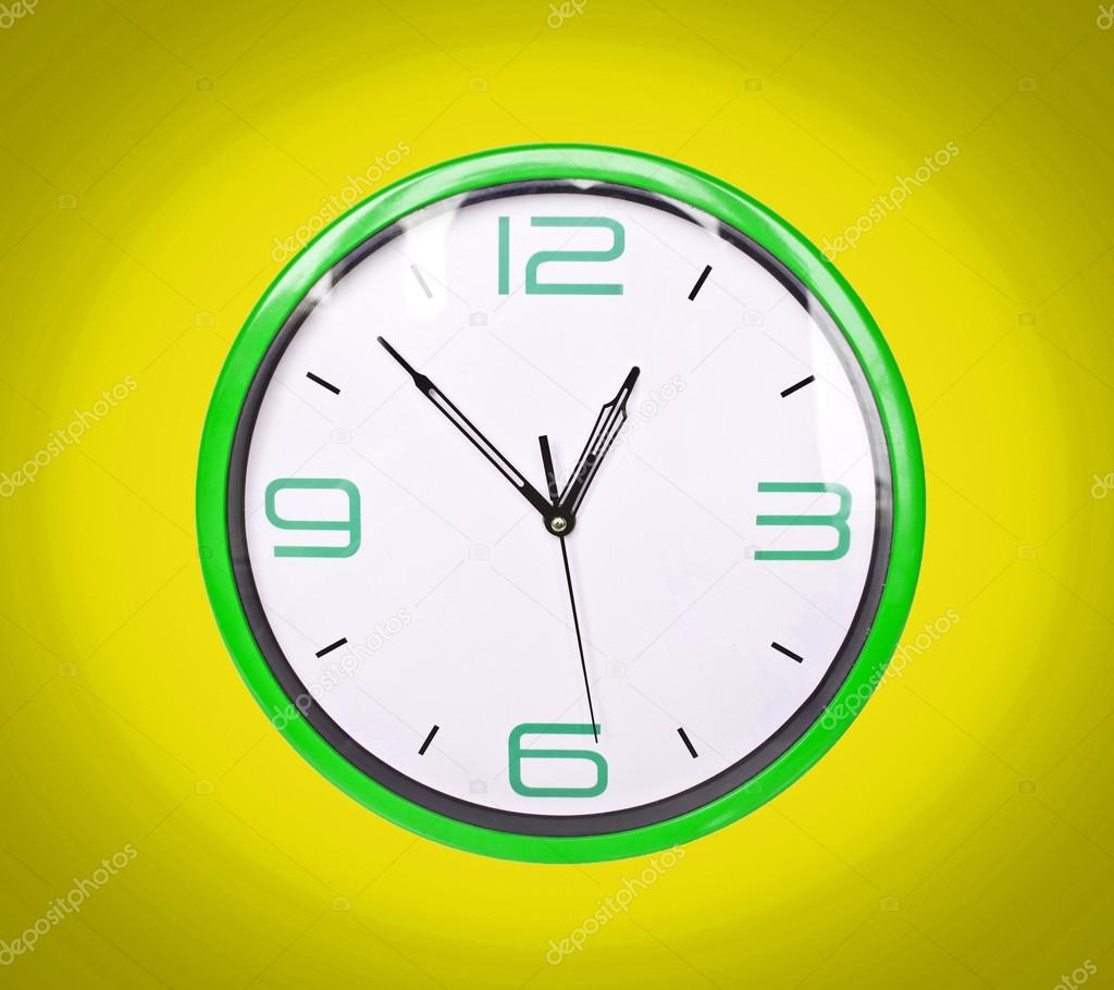 Retro green clock on yellow background — Stock Photo © Alexis84 #14548107