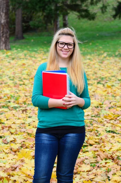 Portrait of happy blonde student girl — Stock Photo, Image