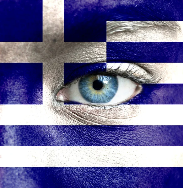 Human face painted with flag of Greece — Stock Photo, Image