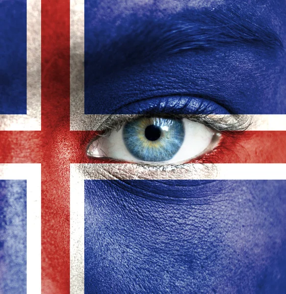 Human face painted with flag of Iceland — Stock Photo, Image