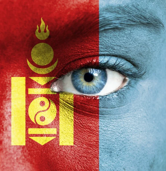 Human face painted with flag of Mongolia — Stock Photo, Image