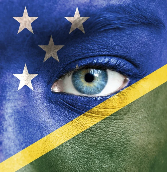 ソロモン諸島の旗と塗られる人間の顔 — ストック写真