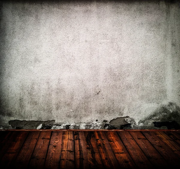 Empty old room with grunge wall and wooden floor — Stock Photo, Image