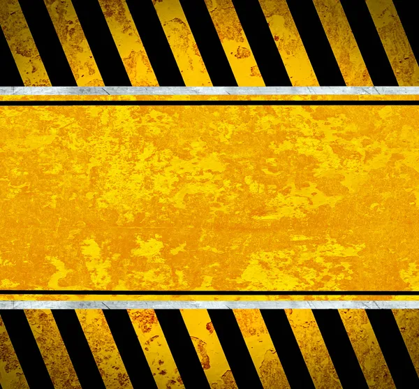 Grunge metal plate with warning stripes — Stock Photo, Image