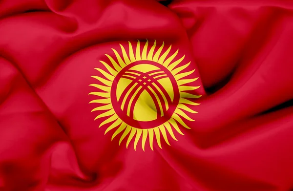 Kirgisistan schwenkt Flagge — Stockfoto