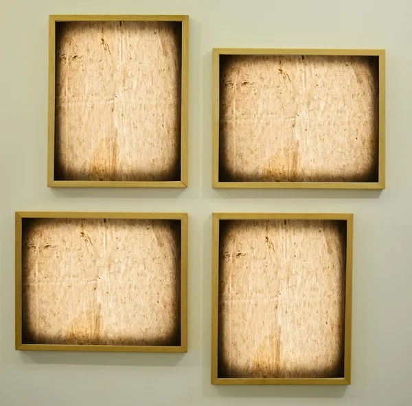 Gallery room with empty frames — Stock Photo, Image