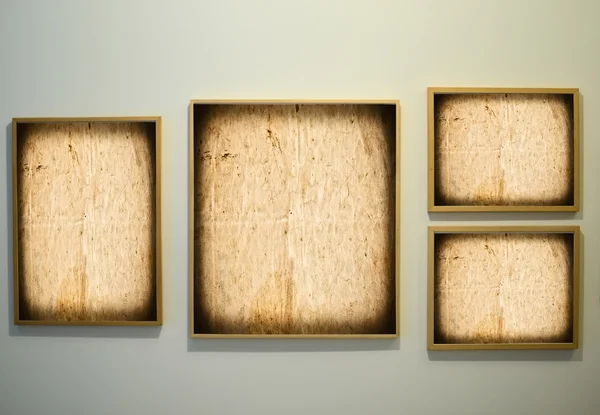 Picture frames on gallery wall — Stock Photo, Image