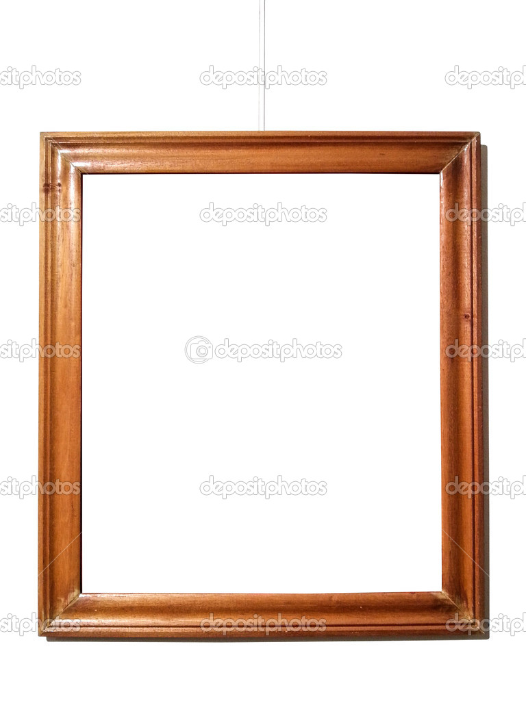 Empty wood frame hanging on white wall