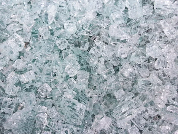 Broken glass in pieces background — Stock Photo, Image
