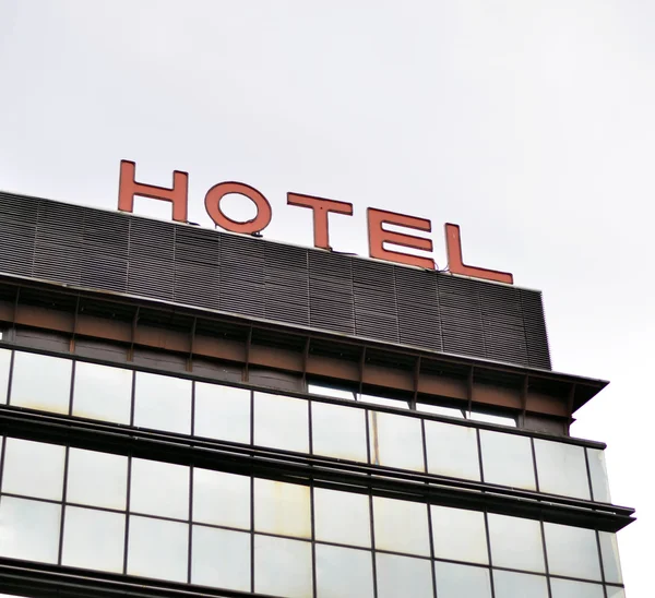 Firma del hotel en el edificio - Concepto del hotel — Foto de Stock