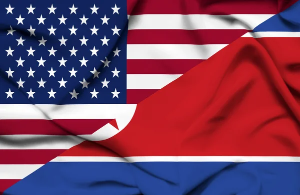 Соединенные Штаты Америки и Северная Корея размахивают флагом — стоковое фото