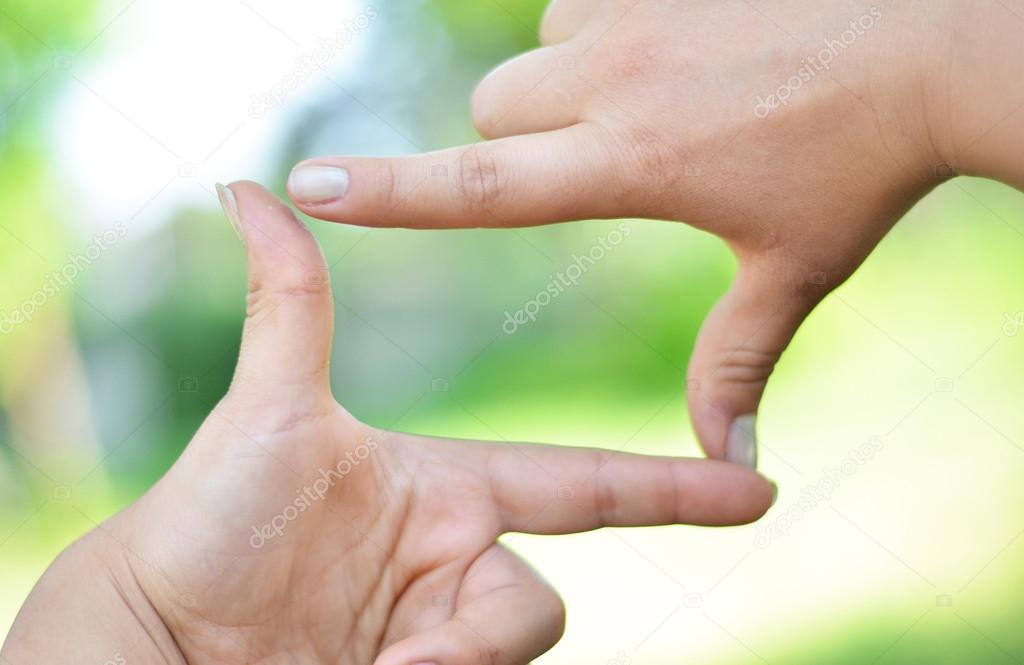 Close up of hands making frame gesture