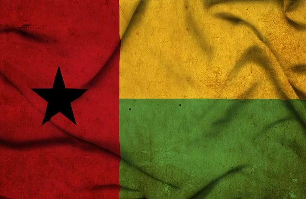 Bissau-Guinea integetett zászló — Stock Fotó