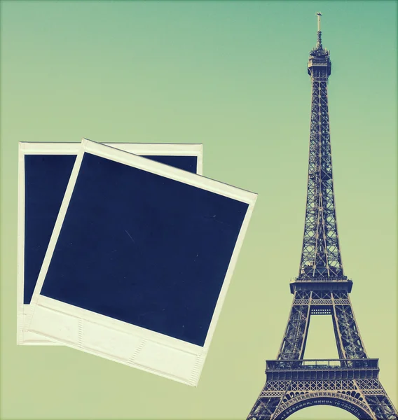 Vintage image of Eiffel tower and blank photo frames — Stock Photo, Image