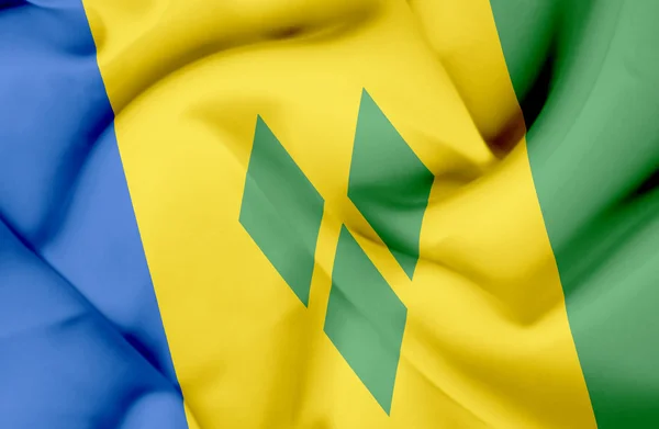 Svatý Vincenc a Grenadiny, mává vlajkou — Stock fotografie
