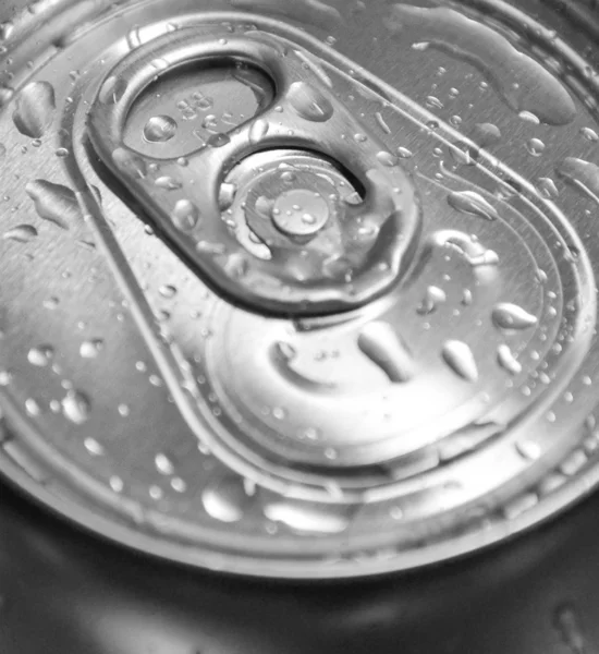 Macro shot of can with water drops — Stock Photo, Image