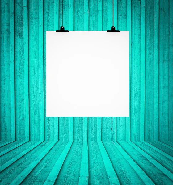 Blank board hanging at wall in turquoise retro room — Stock Photo, Image