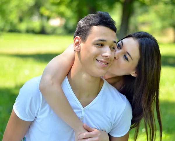 Couple hugging in park — Stock Photo, Image