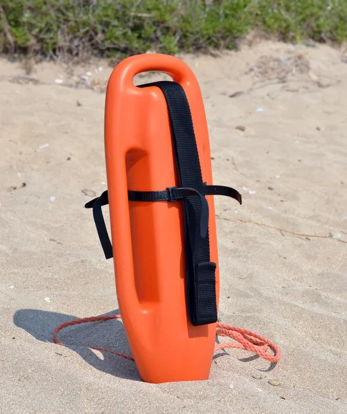 Lifeguard standing in the sand — Stock Photo, Image