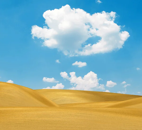 Sandklitter og lyse blå himmel - Stock-foto