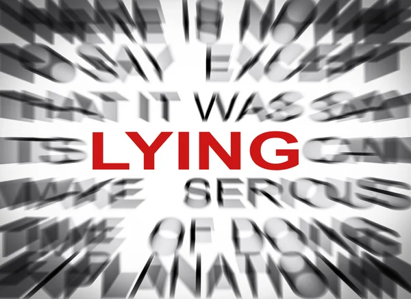 Texte flou mettant l'accent sur LYING — Photo