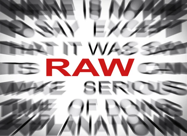 Texte flou mettant l'accent sur RAW — Photo