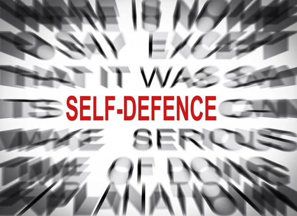 Blured text med fokus på självförsvar — Stockfoto