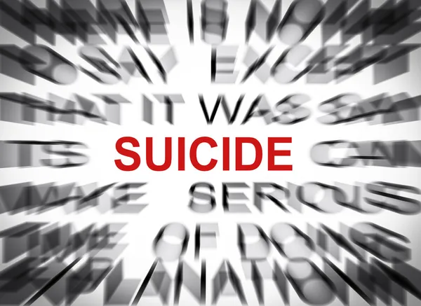 Testo blured con focus su SUICIDE — Foto Stock
