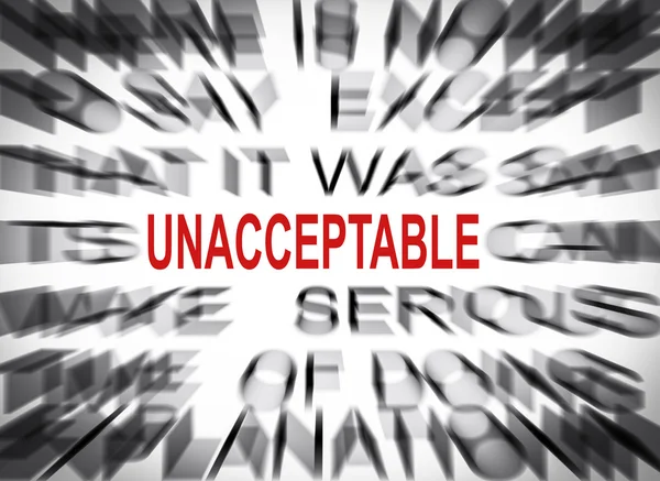 Blured text with focus on UNACCEPTABLE — Stock Photo, Image