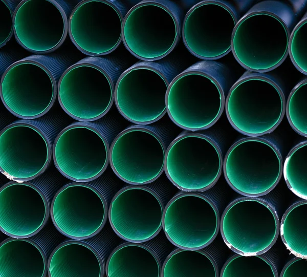 Plástico tubos industriais fundo — Fotografia de Stock