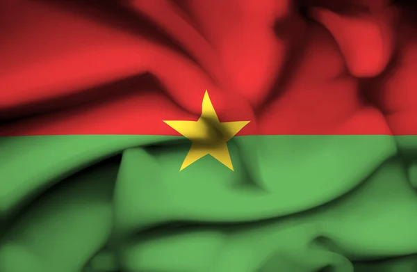 Буркина-Фасо размахивает флагом — стоковое фото