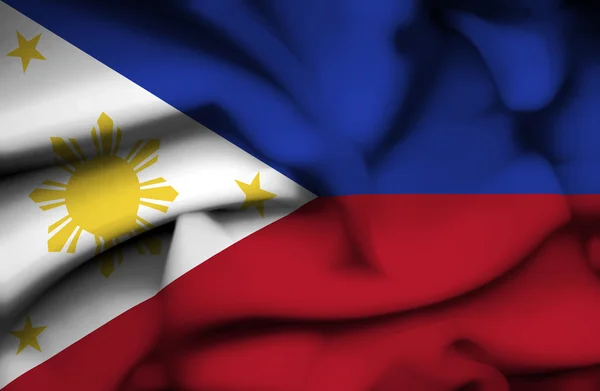 Филиппины, размахивающие флагом — стоковое фото